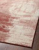 The Spirit SPI-03 Rose / Spice Area Rug highlights romantic rose and spirited spice tones and abstract texture in a beautifully made power-loomed 100% polypropylene area rug