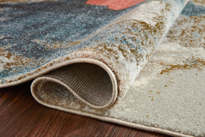The Spirit SPI-05 Stone / Multi Area Rug transforms any space with grounding stone and vibrant multi-toned tones and abstract design in a power-loomed 100% polypropylene area rug