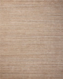 The Sterling STL-01 Natural Area Rug is a hand-loomed polyester area rug that radiates warm natural charm