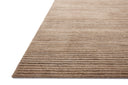 The Sterling STL-01 Natural Area Rug is a hand-loomed polyester area rug that radiates warm natural charm