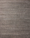 Layered in grounding stone hues, the Sterling STL-01 Stone Area Rug is a hand-loomed polyester area rug perfect for any setting