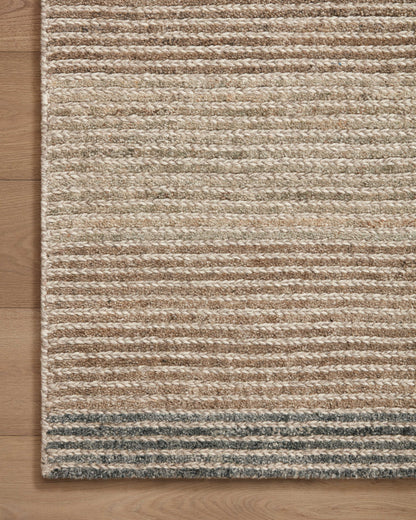 A hand-tufted 100% wool area rug in warm beige and cool slate tones with colorblock and ribbed motifs, the Stiles STI-01 Beige / Slate Area Rug grounds your room beautifully