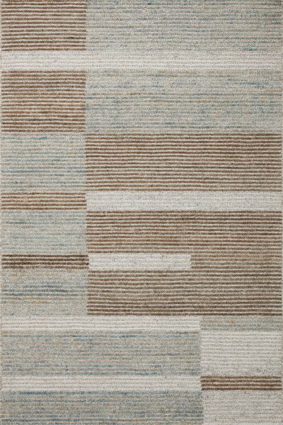 Layered in rich tobacco and tranquil lagoon hues with colorblock and ribbed patterns, the Stiles STI-02 Tobacco / Lagoon Area Rug is a hand-tufted 100% wool area rug perfect for any setting