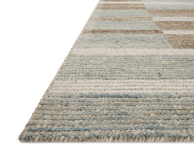 Layered in rich tobacco and tranquil lagoon hues with colorblock and ribbed patterns, the Stiles STI-02 Tobacco / Lagoon Area Rug is a hand-tufted 100% wool area rug perfect for any setting