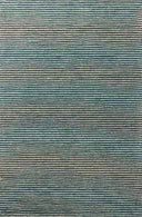 The Sunday SUN-01 Ocean / Ivory Area Rug blends serene ocean and refined ivory tones into a hand-tufted wool area rug with timeless appeal