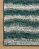 The Sunday SUN-01 Ocean / Ivory Area Rug blends serene ocean and refined ivory tones into a hand-tufted wool area rug with timeless appeal