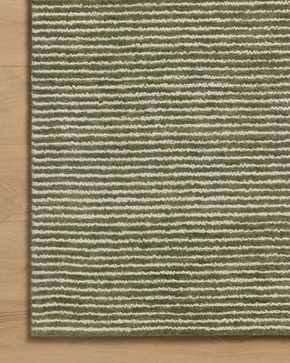 A stunning hand-tufted wool area rug, the Sunday SUN-01 Olive / Ivory Area Rug features earthy olive and refined ivory tones for a polished look