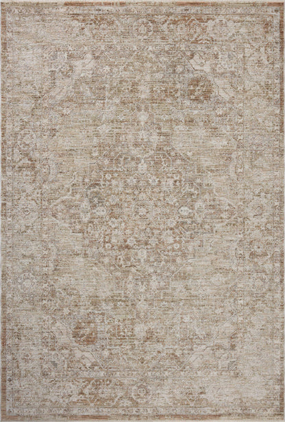 Featuring warm natural and earthy clay hues and traditional detail, the Tabitha TAI-01 Natural / Clay Area Rug is a power-loomed polyester area rug for any room