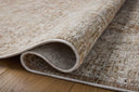 Featuring warm natural and earthy clay hues and traditional detail, the Tabitha TAI-01 Natural / Clay Area Rug is a power-loomed polyester area rug for any room