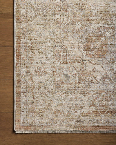 Featuring warm natural and earthy clay hues and traditional detail, the Tabitha TAI-01 Natural / Clay Area Rug is a power-loomed polyester area rug for any room