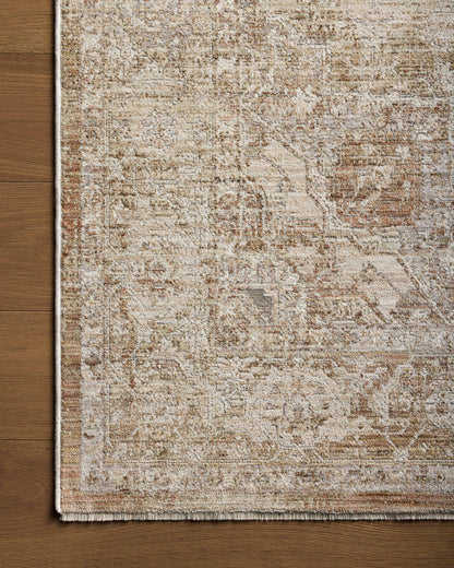 Featuring warm natural and earthy clay hues and traditional detail, the Tabitha TAI-01 Natural / Clay Area Rug is a power-loomed polyester area rug for any room