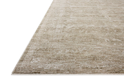 A power-loomed polyester area rug with traditional flair in calming sage and refined ivory tones, the Tabitha TAI-02 Sage / Ivory Area Rug anchors any room