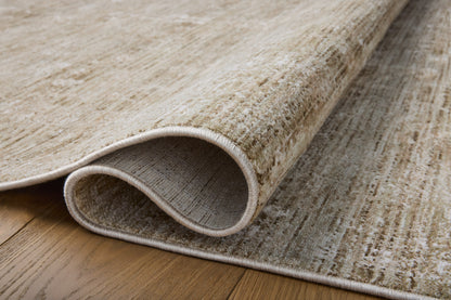 A power-loomed polyester area rug with traditional flair in calming sage and refined ivory tones, the Tabitha TAI-02 Sage / Ivory Area Rug anchors any room