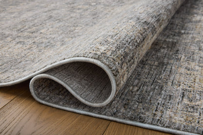 The Tabitha TAI-02 Stone / Natural Area Rug pairs grounding stone and warm natural tones and traditional patterns in a power-loomed polyester area rug