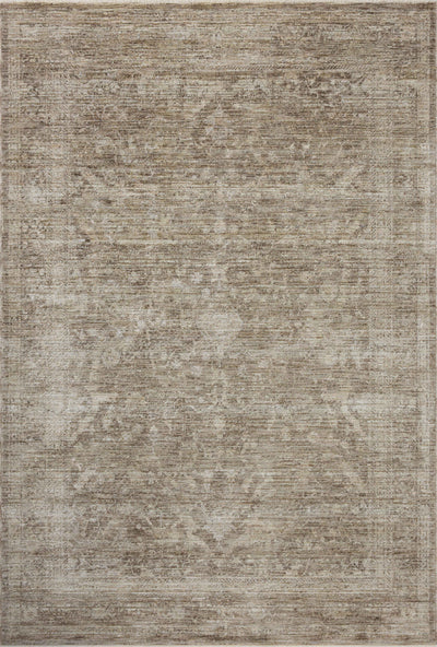 Crafted as a power-loomed polyester area rug, the Tabitha TAI-02 Taupe / Pebble Area Rug brings versatile taupe and subtle pebble warmth and traditional character to your space