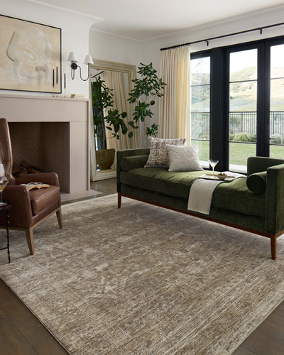 Crafted as a power-loomed polyester area rug, the Tabitha TAI-02 Taupe / Pebble Area Rug brings versatile taupe and subtle pebble warmth and traditional character to your space