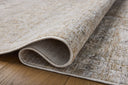 With refined ivory and khaki hues and traditional styling, the Tabitha TAI-03 Ivory / Khaki Area Rug is a power-loomed polyester area rug that elevates any room