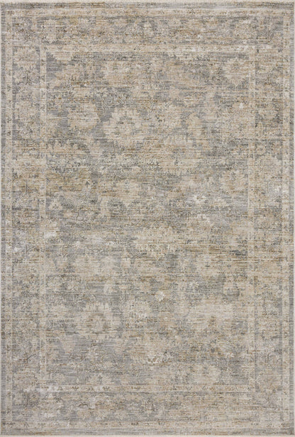 The Tabitha TAI-04 Slate / Natural Area Rug blends cool slate and warm natural tones and traditional motifs into a power-loomed polyester area rug with timeless appeal