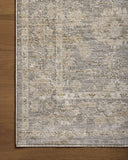 The Tabitha TAI-04 Slate / Natural Area Rug blends cool slate and warm natural tones and traditional motifs into a power-loomed polyester area rug with timeless appeal