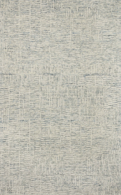 The Tallulah TLL-03 Sky / Ivory Area Rug pairs breezy sky-blue and refined ivory tones and abstract and linear patterns in a hand-tufted 100% wool area rug