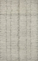 Crafted as a hand-tufted 100% wool area rug, the Tallulah TLL-04 Stone / Ivory Area Rug brings grounding stone and refined ivory warmth and abstract and linear character to your space
