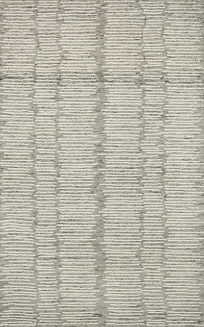 Crafted as a hand-tufted 100% wool area rug, the Tallulah TLL-04 Stone / Ivory Area Rug brings grounding stone and refined ivory warmth and abstract and linear character to your space