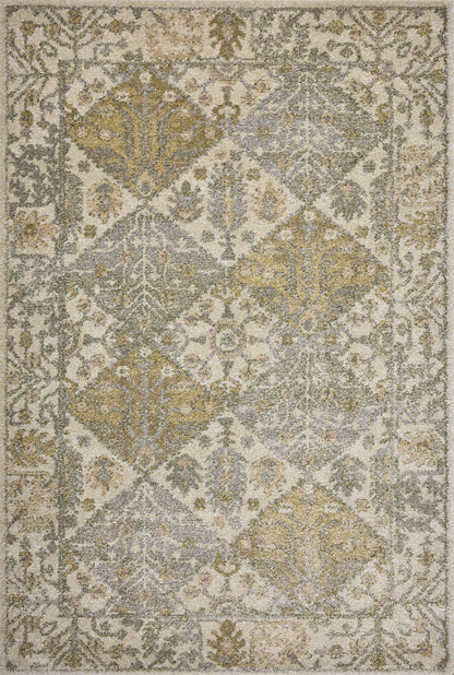 With warm beige and vibrant multi-toned hues, the Tamryn TAM-01 Beige / Multi Area Rug is a power-loomed 100% polypropylene area rug that elevates any room
