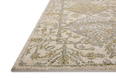 With warm beige and vibrant multi-toned hues, the Tamryn TAM-01 Beige / Multi Area Rug is a power-loomed 100% polypropylene area rug that elevates any room