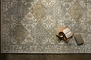 With warm beige and vibrant multi-toned hues, the Tamryn TAM-01 Beige / Multi Area Rug is a power-loomed 100% polypropylene area rug that elevates any room