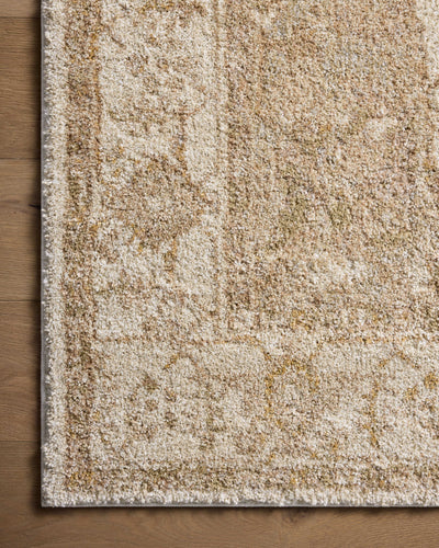 The Tamryn TAM-02 Natural / Blush Area Rug blends warm natural and delicate blush tones into a power-loomed 100% polypropylene area rug with timeless appeal