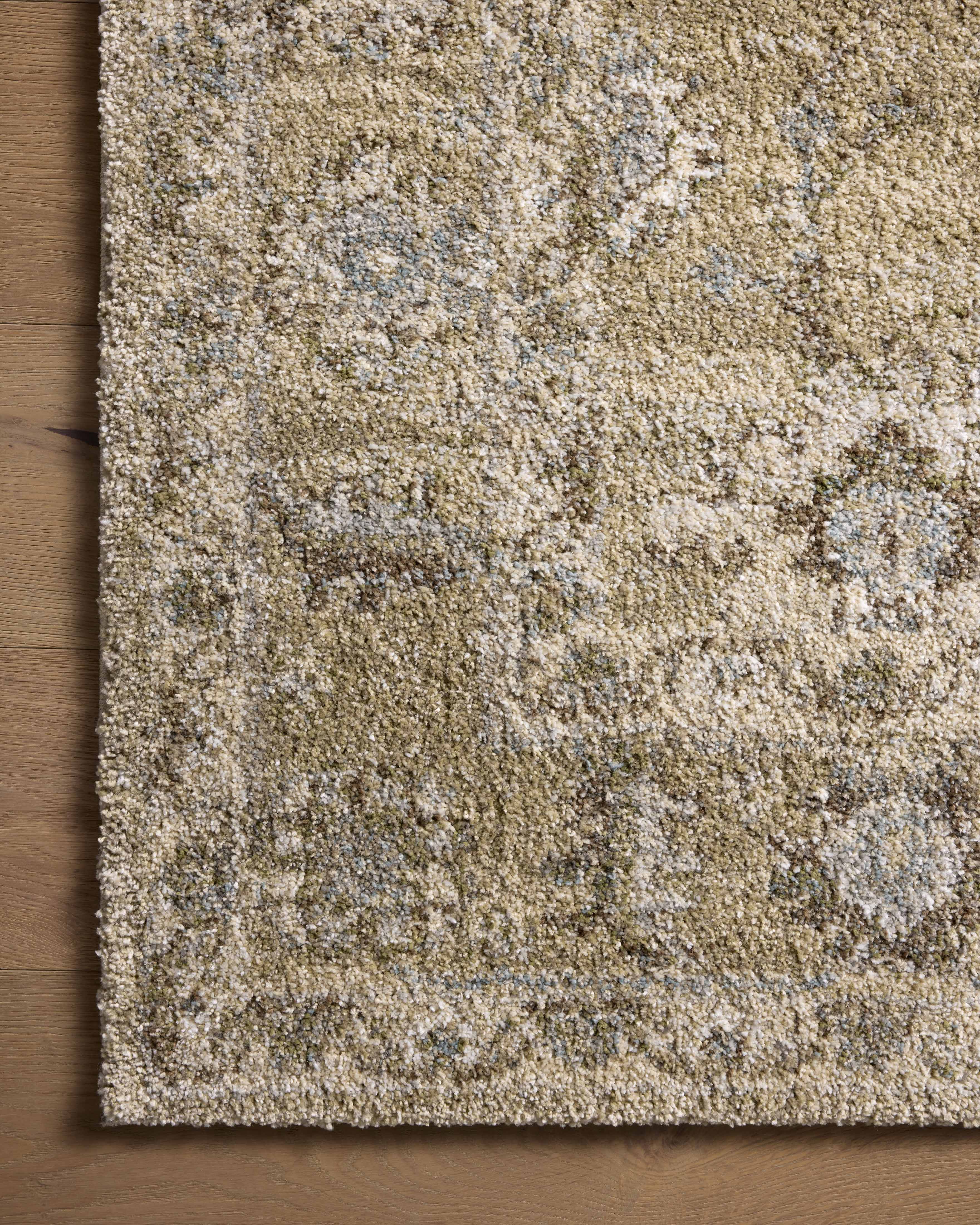 The Tamryn TAM-03 Sage / Stone Area Rug delivers calming sage and grounding stone beauty in a power-loomed 100% polypropylene area rug