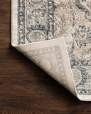 A power-loomed polypropylene and polyester area rug featuring contemporary design and warm natural and light grey tones, the Teagan TEA-01 Natural / Lt. Grey Area Rug adds character to any room