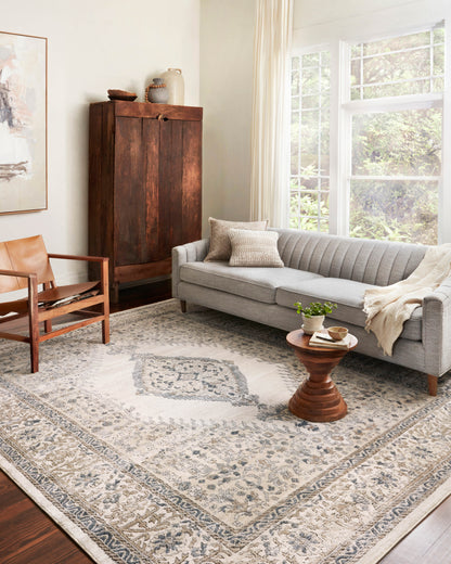 Rich in cozy oatmeal and refined ivory hues with contemporary detail, the Teagan TEA-02 Oatmeal / Ivory Area Rug is a power-loomed polypropylene and polyester area rug built for style and comfort