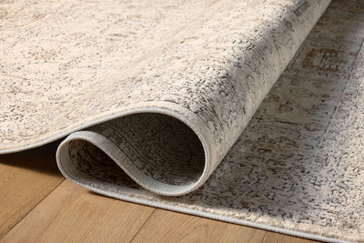 Expertly crafted as a power-loomed polypropylene and polyester area rug with contemporary artistry, the Teagan TEA-03 Ivory / Sand Area Rug captures refined ivory and sandy tones beautifully