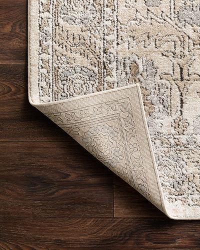 Expertly crafted as a power-loomed polypropylene and polyester area rug with contemporary artistry, the Teagan TEA-03 Ivory / Sand Area Rug captures refined ivory and sandy tones beautifully