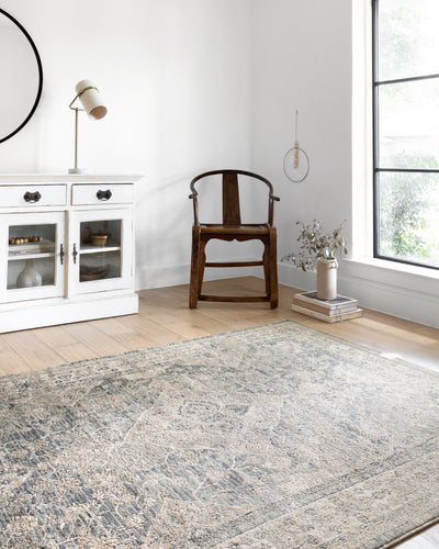 The Teagan TEA-04 Sky / Natural Area Rug brings breezy sky-blue and warm natural character and contemporary flair to your home in a power-loomed polypropylene and polyester area rug