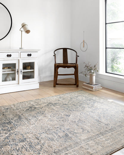 The Teagan TEA-04 Sky / Natural Area Rug brings breezy sky-blue and warm natural character and contemporary flair to your home in a power-loomed polypropylene and polyester area rug