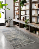Finished in casual denim and cool slate tones with contemporary styling, the Teagan TEA-05 Denim / Slate Area Rug is a power-loomed polypropylene and polyester area rug for modern living
