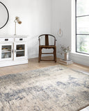The Teagan TEA-07 Natural / Denim Area Rug highlights warm natural and casual denim tones and contemporary texture in a beautifully made power-loomed polypropylene and polyester area rug