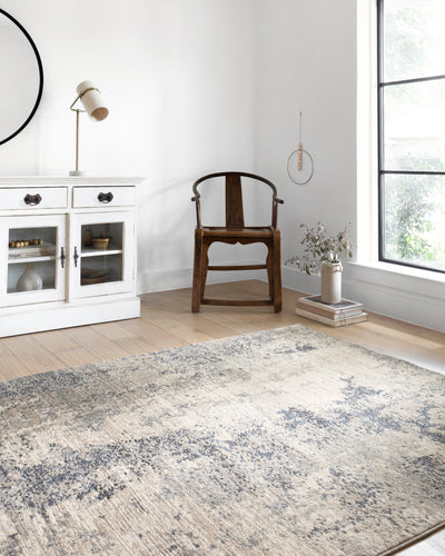 The Teagan TEA-07 Natural / Denim Area Rug highlights warm natural and casual denim tones and contemporary texture in a beautifully made power-loomed polypropylene and polyester area rug