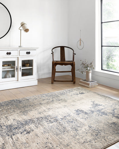 The Teagan TEA-07 Natural / Denim Area Rug highlights warm natural and casual denim tones and contemporary texture in a beautifully made power-loomed polypropylene and polyester area rug
