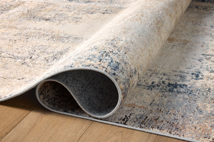 Dressed in refined ivory and soft misty hues with contemporary detail, the Teagan TEA-08 Ivory / Mist Area Rug is a power-loomed polypropylene and polyester area rug that completes any room