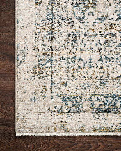 The Theia THE-01 Natural / Ocean Area Rug transforms any space with warm natural and serene ocean tones in a power-loomed polyester pile and rayon area rug