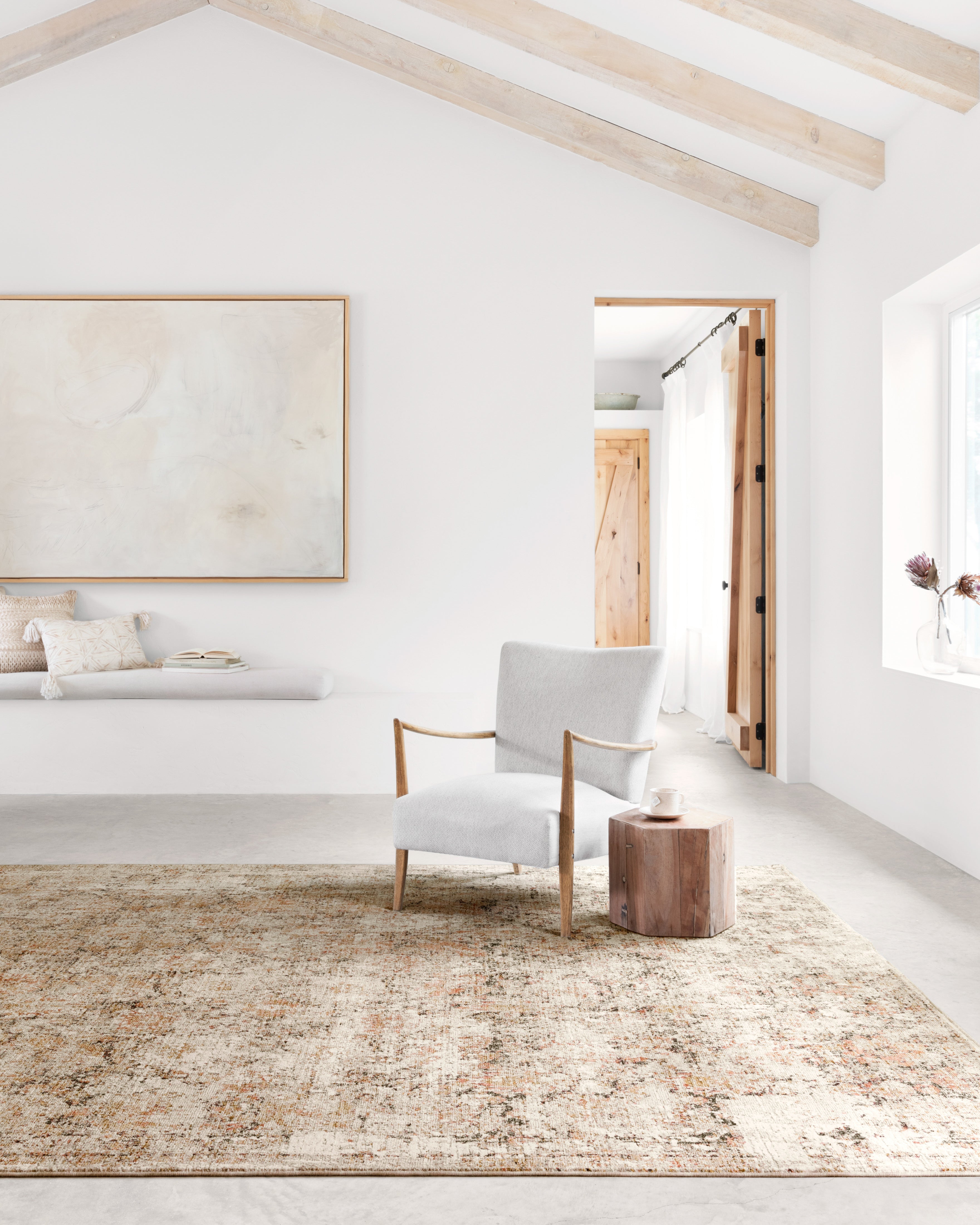 A power-loomed polyester pile and rayon area rug in versatile taupe and radiant gold tones, the Theia THE-02 Taupe / Gold Area Rug grounds your room beautifully