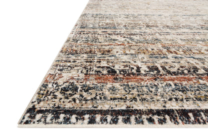 The Theia THE-03 Taupe / Multi Area Rug is a power-loomed polyester pile and rayon area rug that radiates versatile taupe and vibrant multi-toned charm