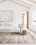 The Theia THE-03 Taupe / Multi Area Rug is a power-loomed polyester pile and rayon area rug that radiates versatile taupe and vibrant multi-toned charm