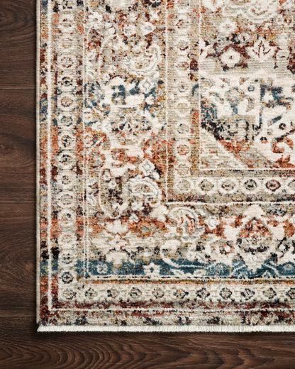 The Theia THE-05 Taupe / Brick Area Rug showcases versatile taupe and rich brick tones in a power-loomed polyester pile and rayon area rug