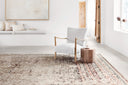 The Theia THE-05 Taupe / Brick Area Rug showcases versatile taupe and rich brick tones in a power-loomed polyester pile and rayon area rug