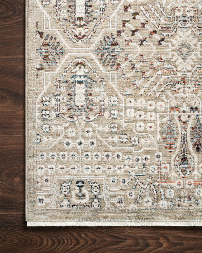 Featuring striking granite and refined ivory hues, the Theia THE-06 Granite / Ivory Area Rug is a power-loomed polyester pile and rayon area rug for any room