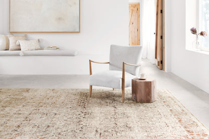 A power-loomed polyester pile and rayon area rug in warm natural and warm rust tones, the Theia THE-07 Natural / Rust Area Rug anchors any room